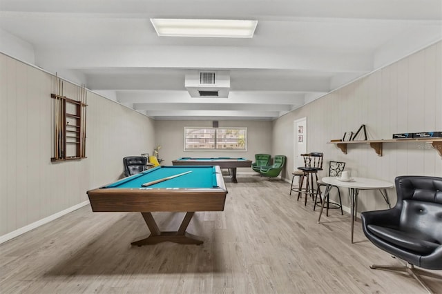 game room with beam ceiling, wood walls, light hardwood / wood-style flooring, and billiards