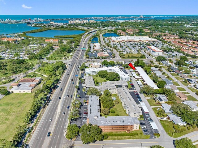 drone / aerial view with a water view