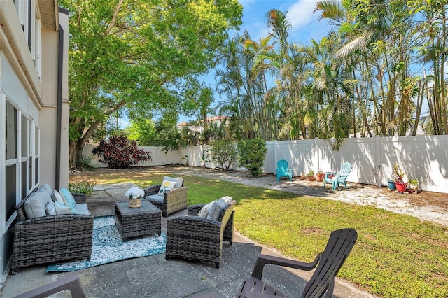 view of patio featuring a fenced backyard and an outdoor hangout area