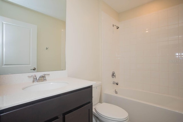 full bathroom with shower / tub combination, vanity, and toilet