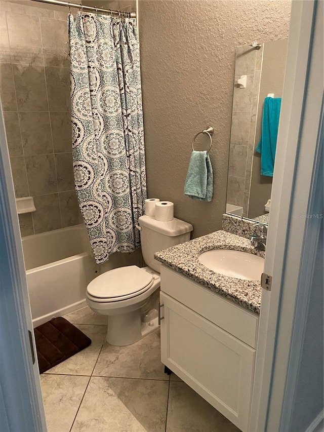 full bathroom with tile patterned flooring, vanity, toilet, and shower / bathtub combination with curtain