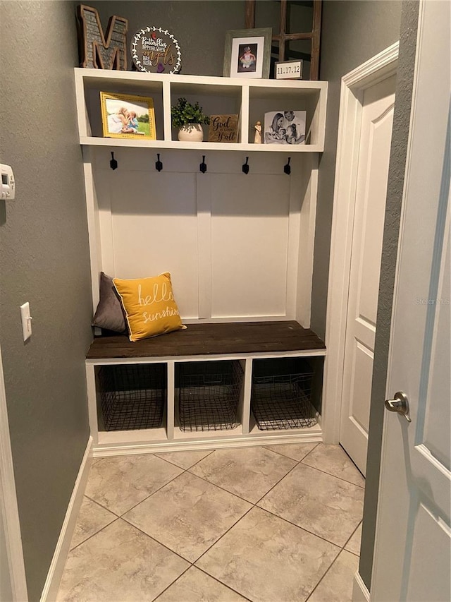 mudroom featuring light tile patterned floors