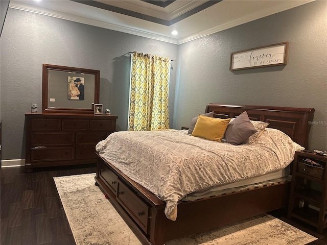 2875 Creeks Crossing Blvd, Lakeland, FL 33810 - bedroom with ornamental molding, dark wood-type flooring, a textured wall, a raised ceiling, and baseboards