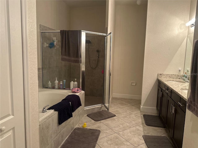 2875 Creeks Crossing Blvd, Lakeland, FL 33810 - bathroom featuring a shower stall, tile patterned floors, vanity, and a bath