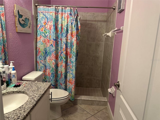 2875 Creeks Crossing Blvd, Lakeland, FL 33810 - full bath with a stall shower, toilet, tile patterned flooring, vanity, and a textured wall
