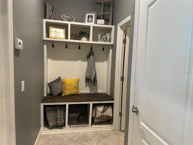 2875 Creeks Crossing Blvd, Lakeland, FL 33810 - mudroom featuring light tile patterned floors, baseboards, and a textured wall