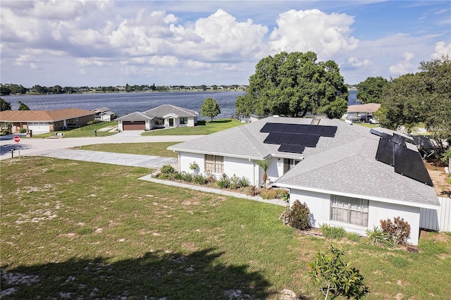 aerial view featuring a water view