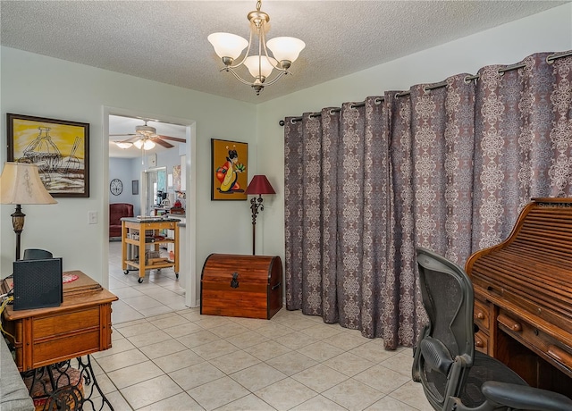 tiled office with ceiling fan with notable chandelier and a textured ceiling