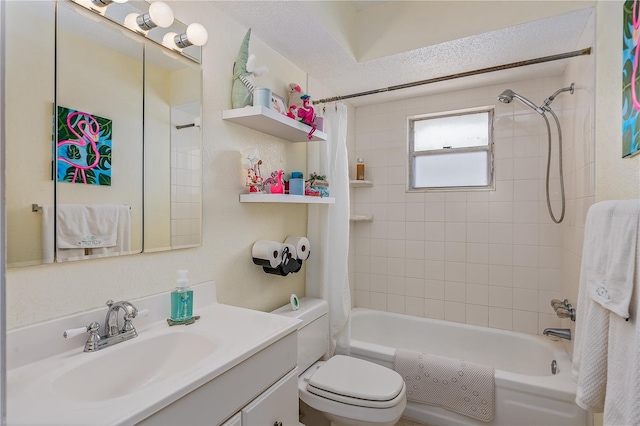 full bathroom with a textured ceiling, vanity, shower / bath combo, and toilet