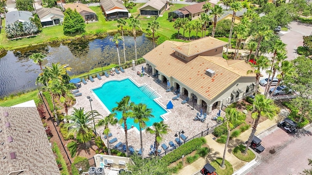 birds eye view of property featuring a water view