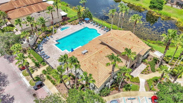 birds eye view of property featuring a water view