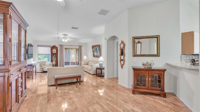 living room featuring ceiling fan