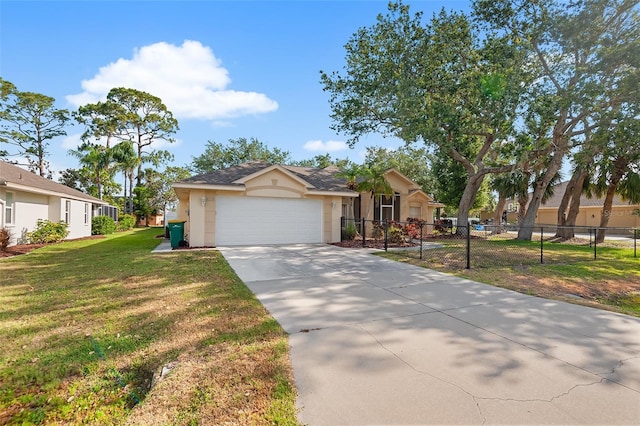 single story home with fence, an attached garage, driveway, stucco siding, and a front lawn