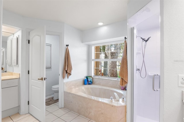 23338 Duchess Ave, Port Charlotte, FL 33954 - full bath with vanity, a stall shower, a garden tub, and tile patterned flooring