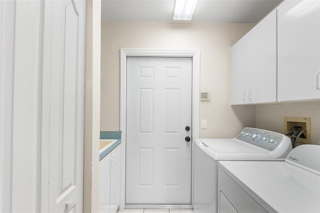 23338 Duchess Ave, Port Charlotte, FL 33954 - washroom with washer and clothes dryer and cabinet space