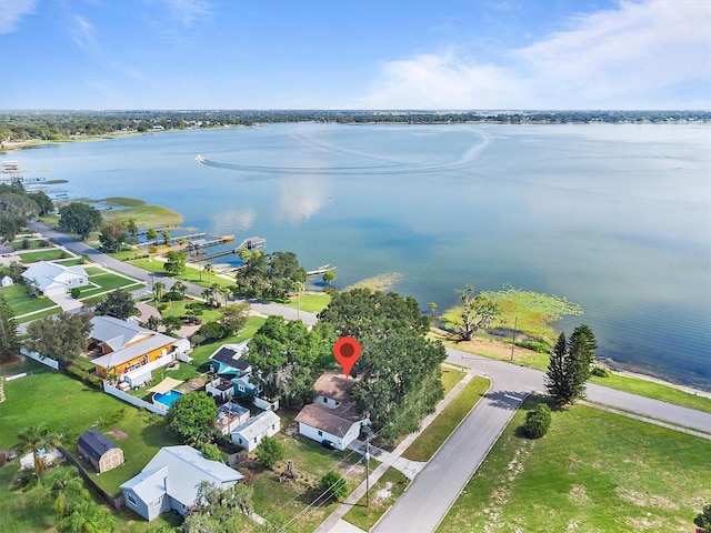 drone / aerial view with a water view