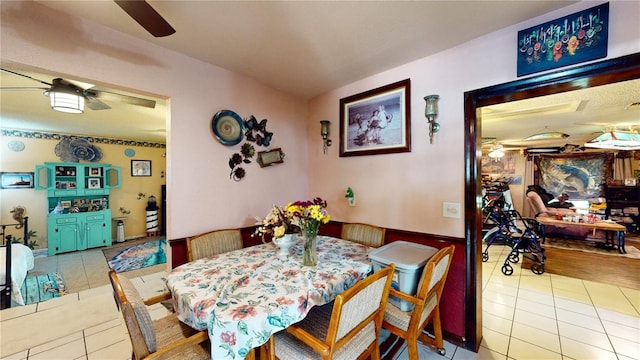 view of tiled dining space