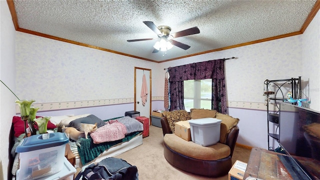 carpeted bedroom with a textured ceiling, ceiling fan, and crown molding