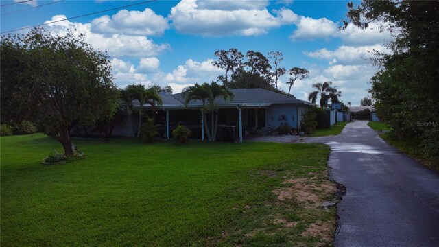 exterior space with a front yard