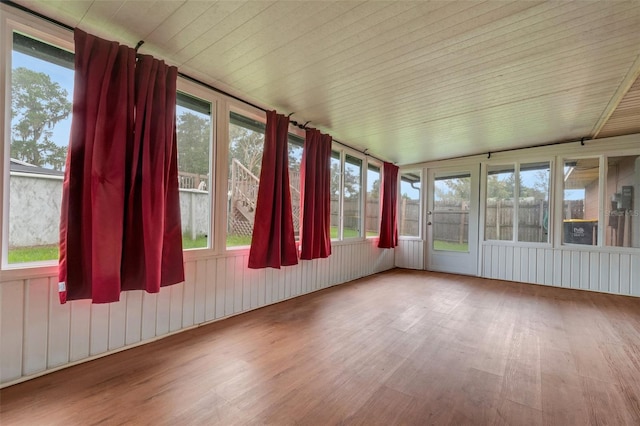 unfurnished sunroom featuring wooden ceiling