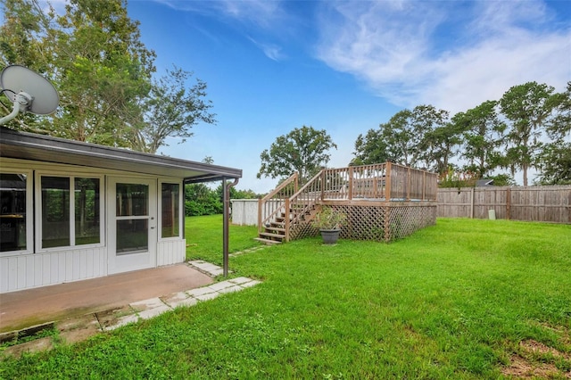 view of yard featuring a deck