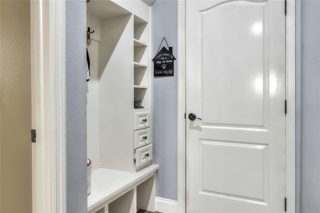 mudroom featuring built in features