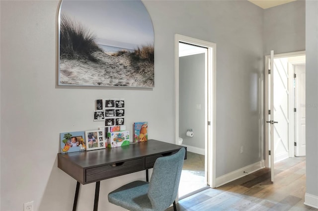 home office featuring light wood-type flooring