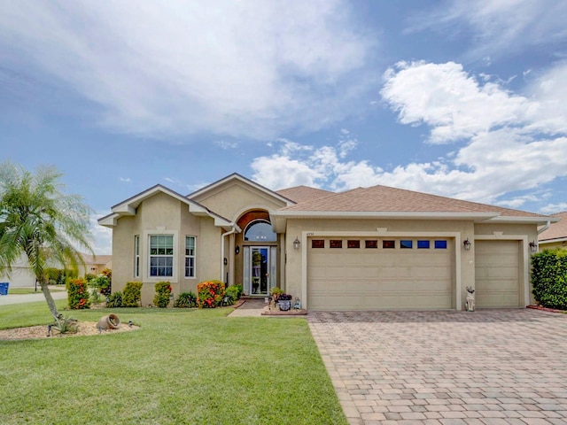 ranch-style house with a front lawn and a garage