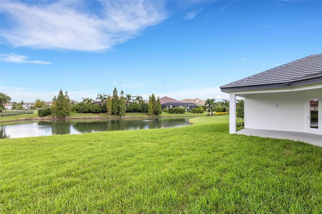 view of yard with a water view