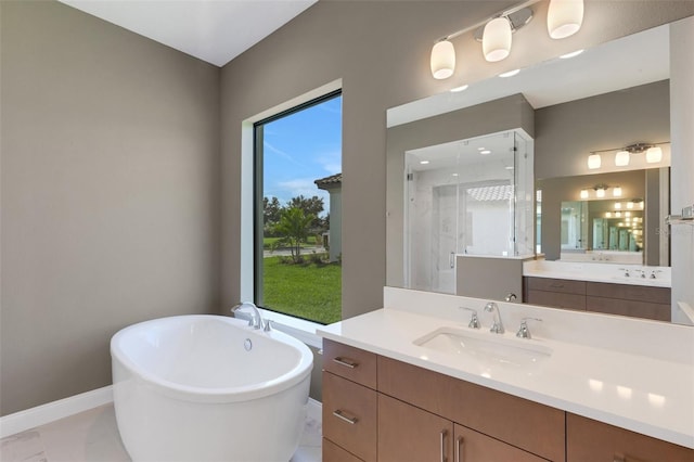 bathroom with separate shower and tub and vanity