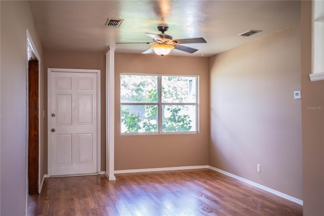 unfurnished room featuring ceiling fan and wood-type flooring