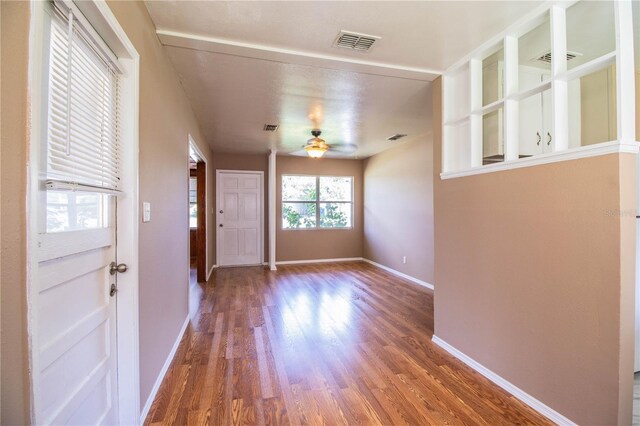 interior space featuring ceiling fan and wood-type flooring