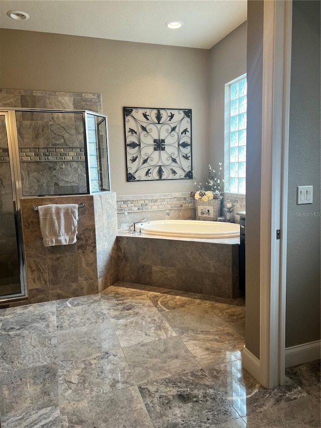 bathroom featuring plus walk in shower