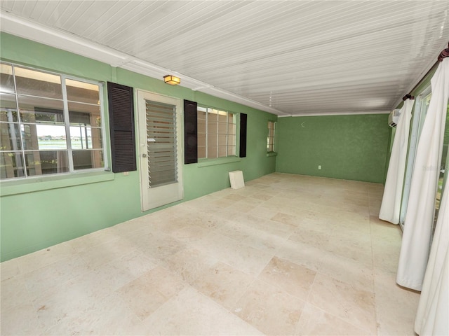 view of patio / terrace with a wall mounted AC