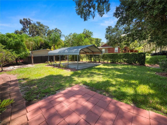 view of yard featuring a carport