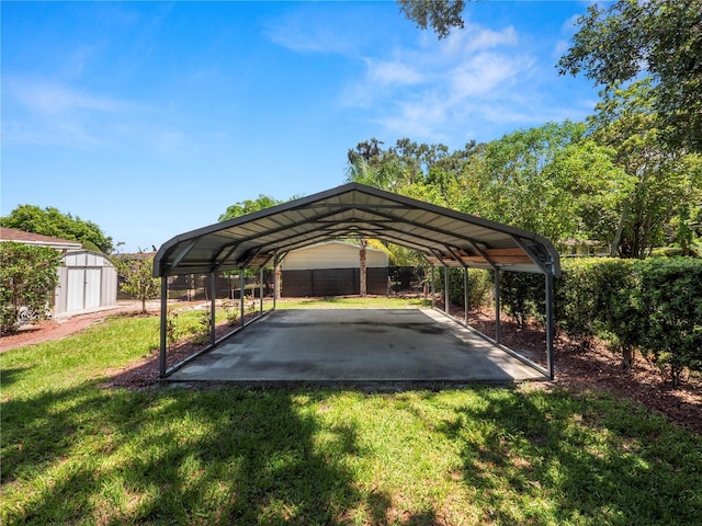 view of parking / parking lot featuring a yard and a carport