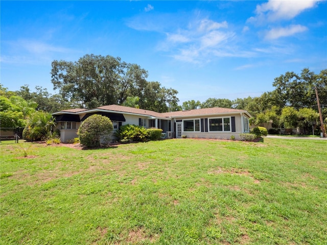 view of front of house with a front lawn