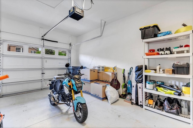 garage featuring a garage door opener