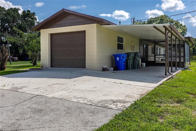 view of property exterior with a garage and a carport