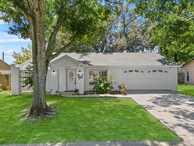 ranch-style house with a front lawn and a garage