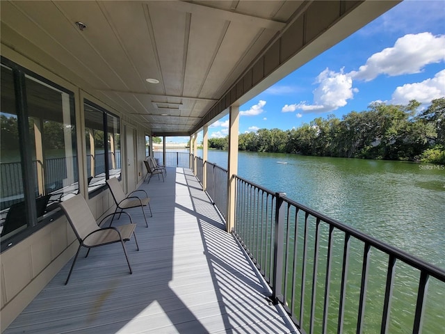 deck featuring a water view