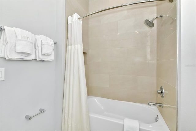 bathroom with shower / bath combo