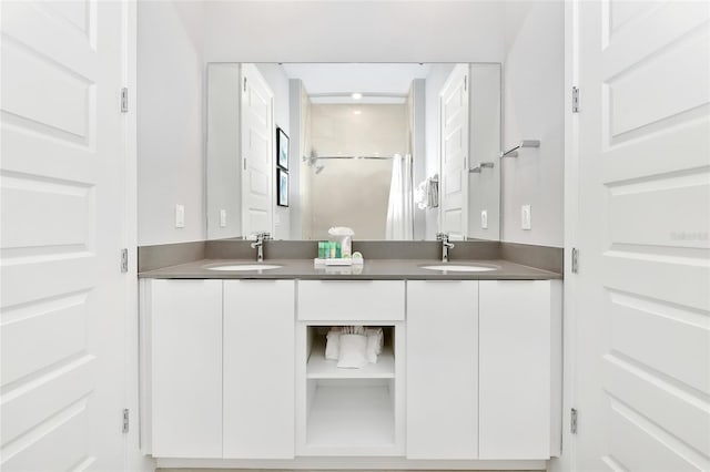 bathroom featuring vanity and walk in shower