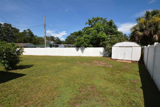 view of yard with a storage shed