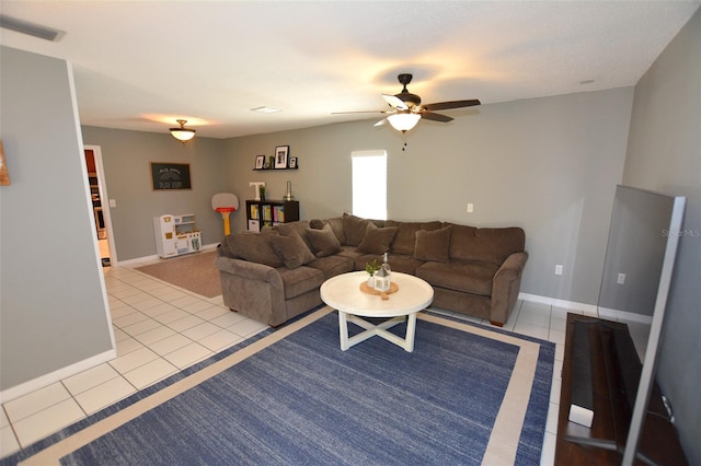 living room with light tile patterned floors and ceiling fan