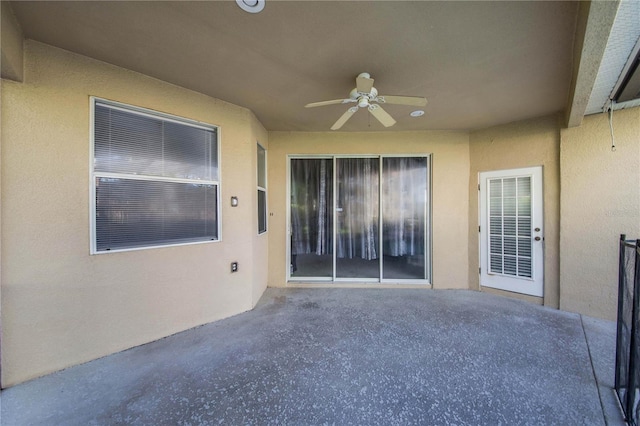 view of patio featuring ceiling fan