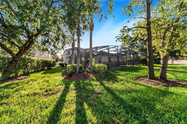 view of yard featuring a lanai