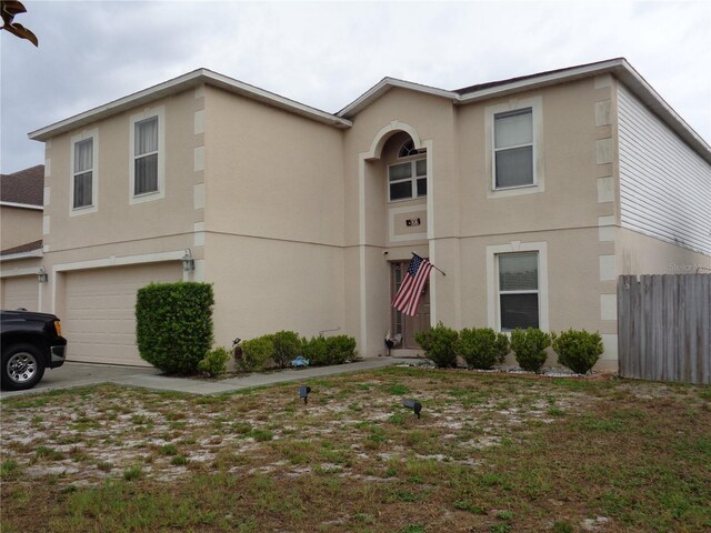 front of property featuring a garage