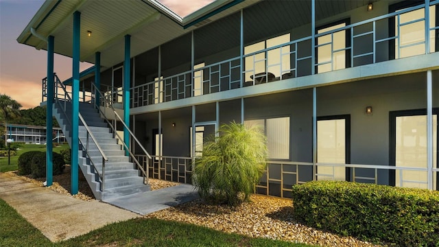 1600 W Lake Parker Dr Unit A2, Lakeland, FL 33805 - property at dusk featuring stairway