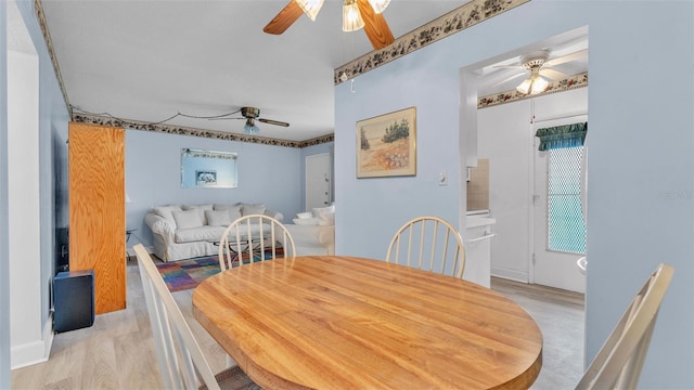 1600 W Lake Parker Dr Unit A2, Lakeland, FL 33805 - dining space with light wood-style floors and a ceiling fan